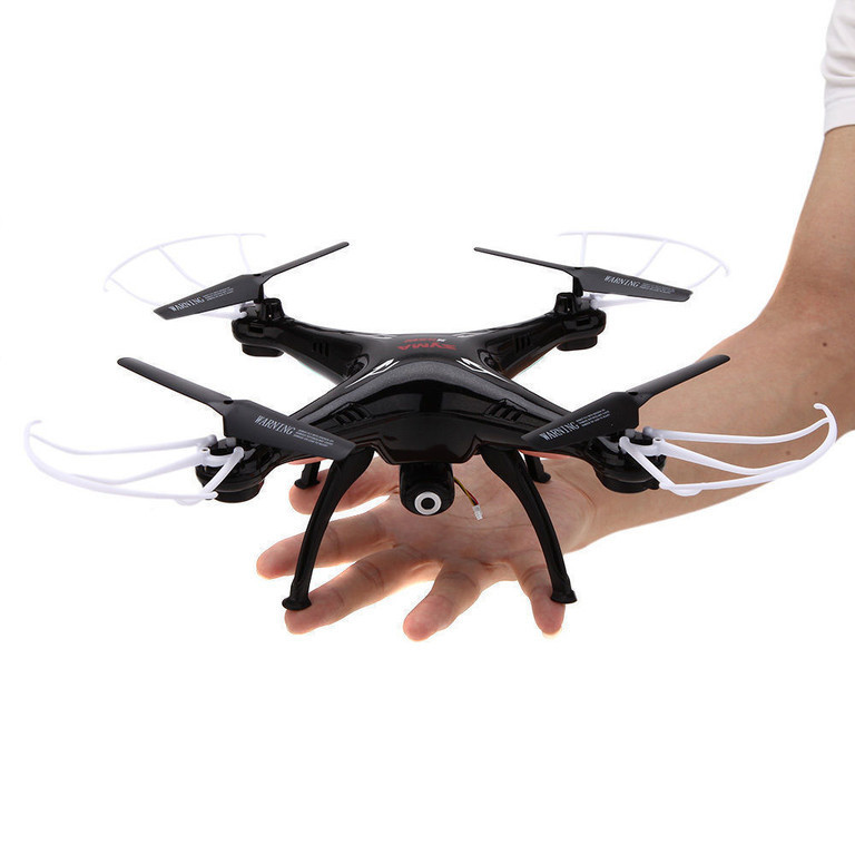 Wifi квадрокоптеры отзывы. Квадрокоптер с143012027. Syma x5sw-1. Квадрокоптер Syma x5c с камерой. Сколько стоит летающий с камерой квадрокоптер.